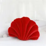 Cojín con forma de concha