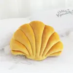 Cojín con forma de concha