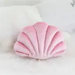 Cojín con forma de concha