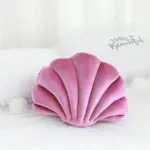 Cojín con forma de concha