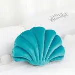 Cojín con forma de concha