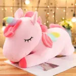 Cojín de peluche de unicornio