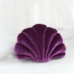 Cojín con forma de concha