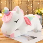 Cojín de peluche de unicornio