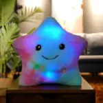 Cojín estrella luminoso