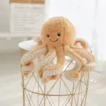 Cojín de peluche de pulpo